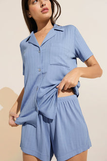 Model wears Gisele TENCELâ„¢ Modal Rib Relaxed Short PJ Set in wedgewood blue.