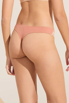 Model wears Flora TENCELâ„¢ Modal Thong in Pink Rouge/Rose.