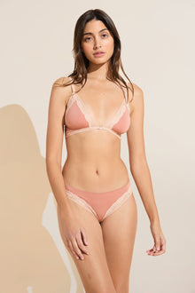 Model wears Flora TENCELâ„¢ Modal Thong in Pink Rouge/Rose.