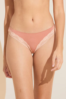 Model wears Flora TENCELâ„¢ Modal Thong in Pink Rouge/Rose.