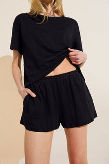 Model wears Organic Linen Knit Short in Black.