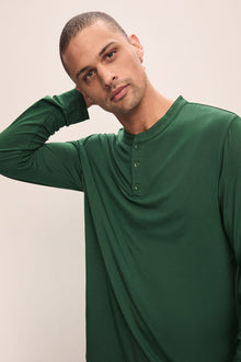 Model wears Henry TENCELâ„¢ Modal Long PJ Set in Forest Green.