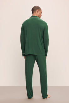 Model wears William TENCELâ„¢ Modal Long PJ Set in Forest Green/Ivory.
