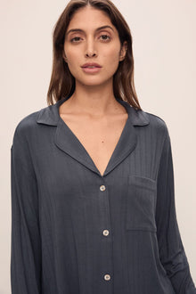 Model wears Gisele TENCELâ„¢ Modal Rib Long PJ Set in Graphite.