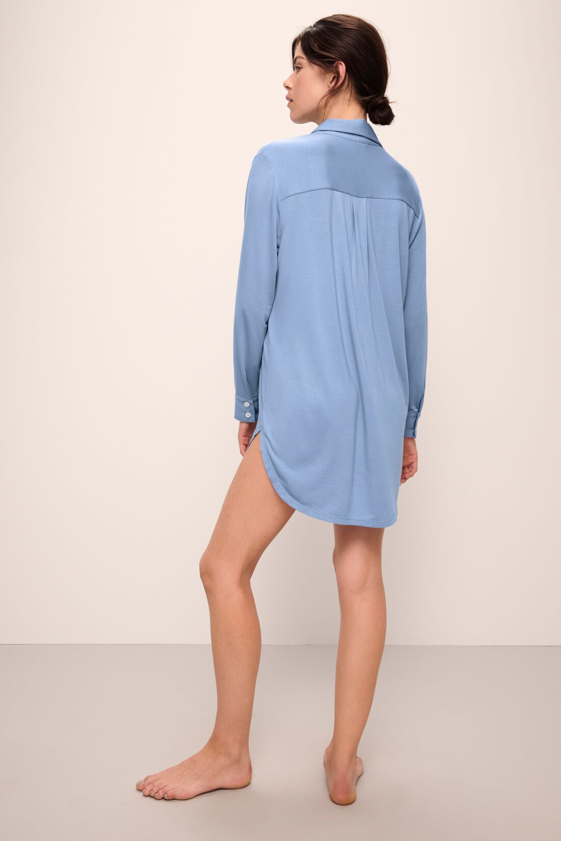 Model wears Gisele TENCEL Modal Boyfriend Sleepshirt in wedgewood blue.