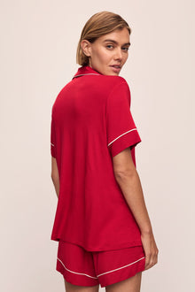 Model wears the Gisele TENCELâ„¢ Modal Relaxed Short PJ Set in Haute Red/Ivory.