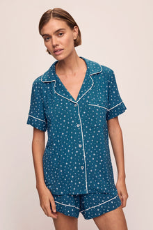Model wears the Gisele Printed TENCELâ„¢ Modal Relaxed Short PJ Set in Festive Lights Sapphire/Ivory.