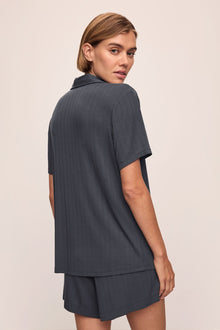 Model wears Gisele TENCEL Modal Rib Relaxed Short PJ Set in Graphite.
