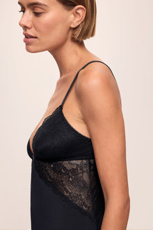 Side image of model wearing Lara TENCEL Modal Slip in black