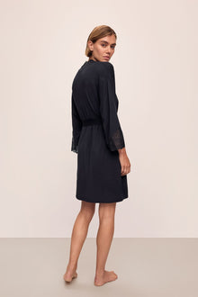 Back image of model wearing Lara TENCEL Modal Short Robe in black