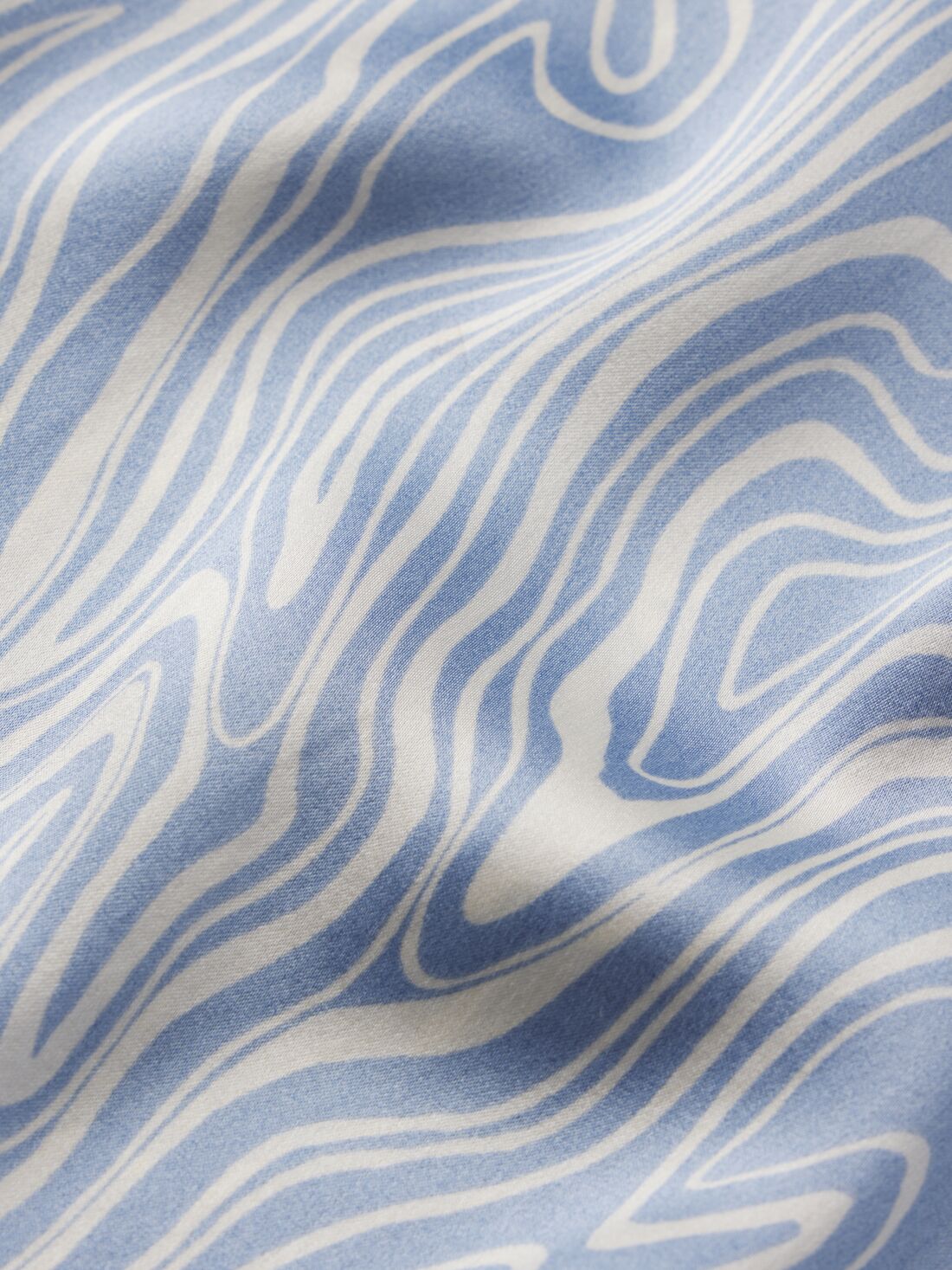 Model wears Inez Washable Silk Printed Short PJ Set in Malachite Wedgewood Blue/Ivory.