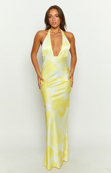 Front view of a yellow and white tie-dye satin halter neck maxi dress with a deep V-neckline