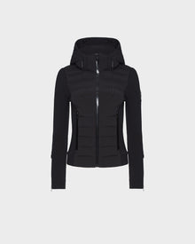 The RUDSAK MABS - 8122553 BLACK is a sleek, fitted women’s puffer jacket with a hood, full front zipper, horizontal quilting, zippered side pockets, and long sleeves. Displayed on a plain white background.