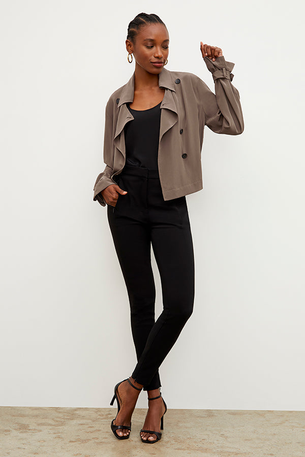 Front image of a woman standing wearing the curie pant in black | Exclude | Grid