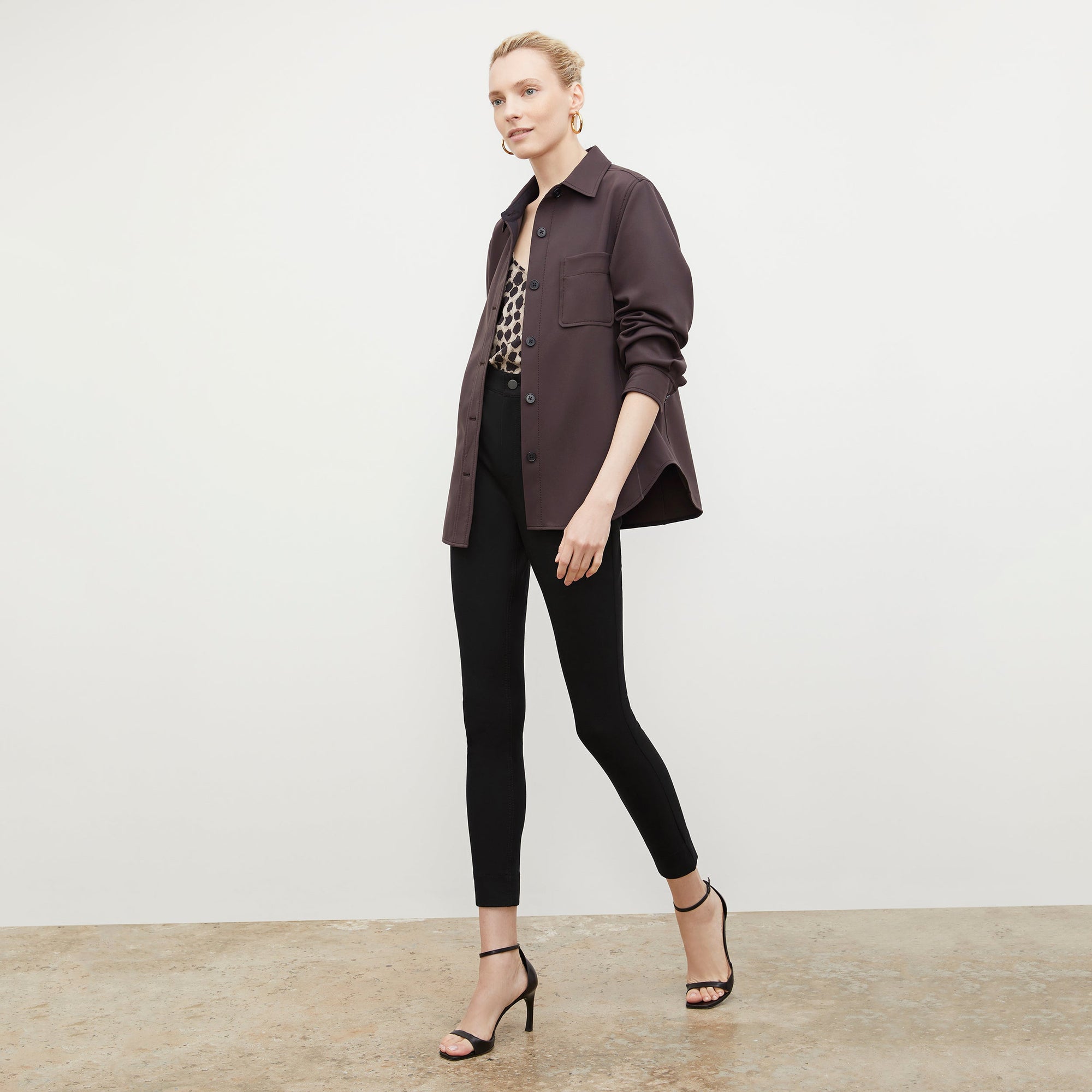 Side image of a woman wearing the Sammataro Jean in Black | Exclude