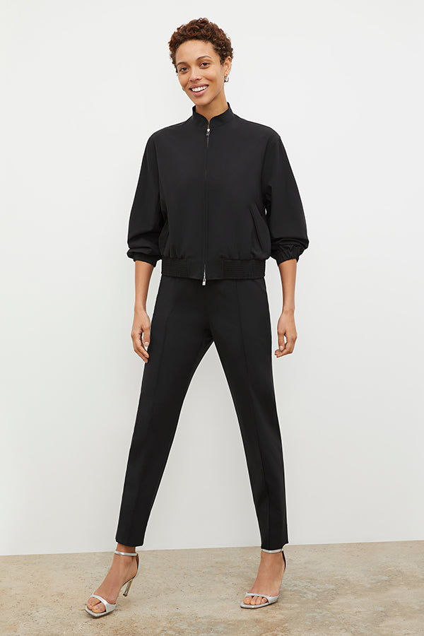 Front image of a woman standing wearing the Colby Jogger in Black | Exclude