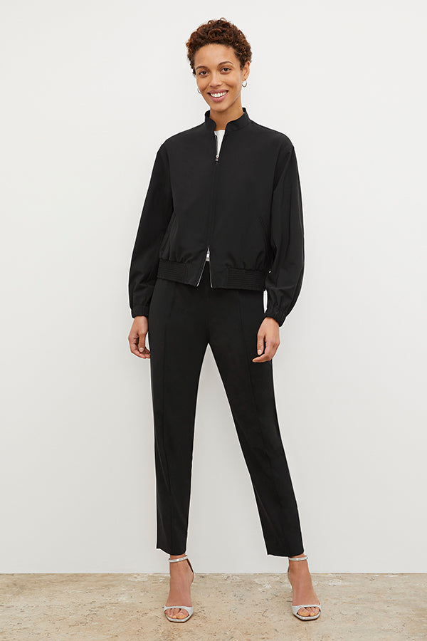 Front image of a woman standing wearing the Colby Jogger in Black | Exclude