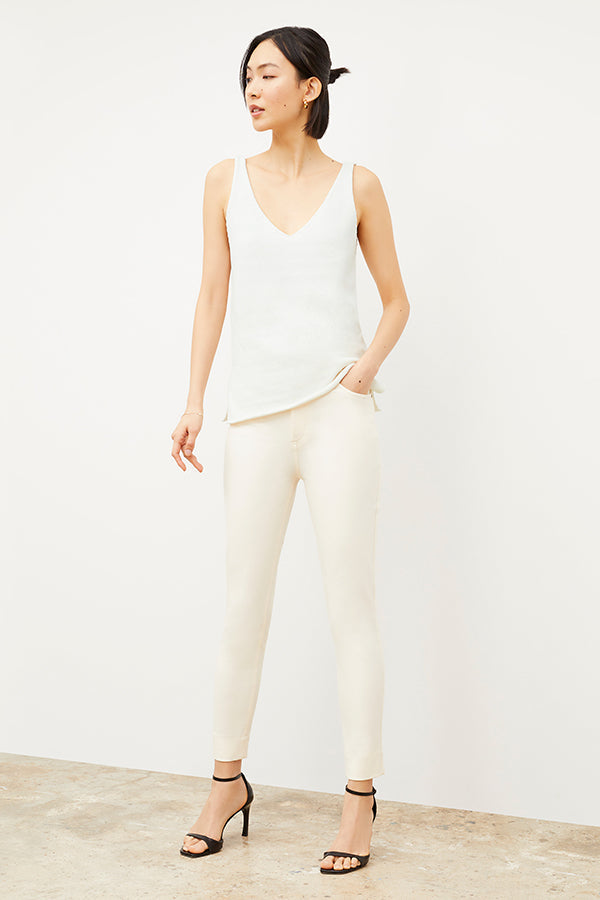 Side image of a woman wearing the Sammataro Jean in Tusk | Exclude | Grid