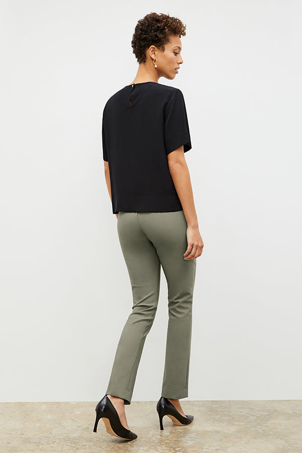 Front image of a woman wearing the foster pant in thyme | Exclude