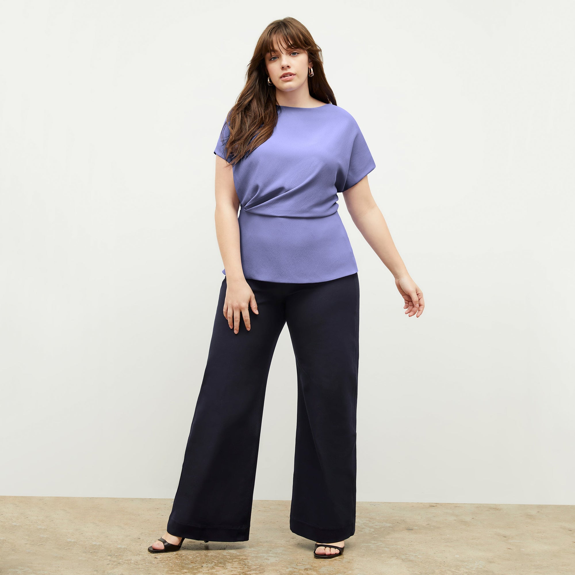 Front image of a woman standing wearing the Milo Jean in ink | Exclude