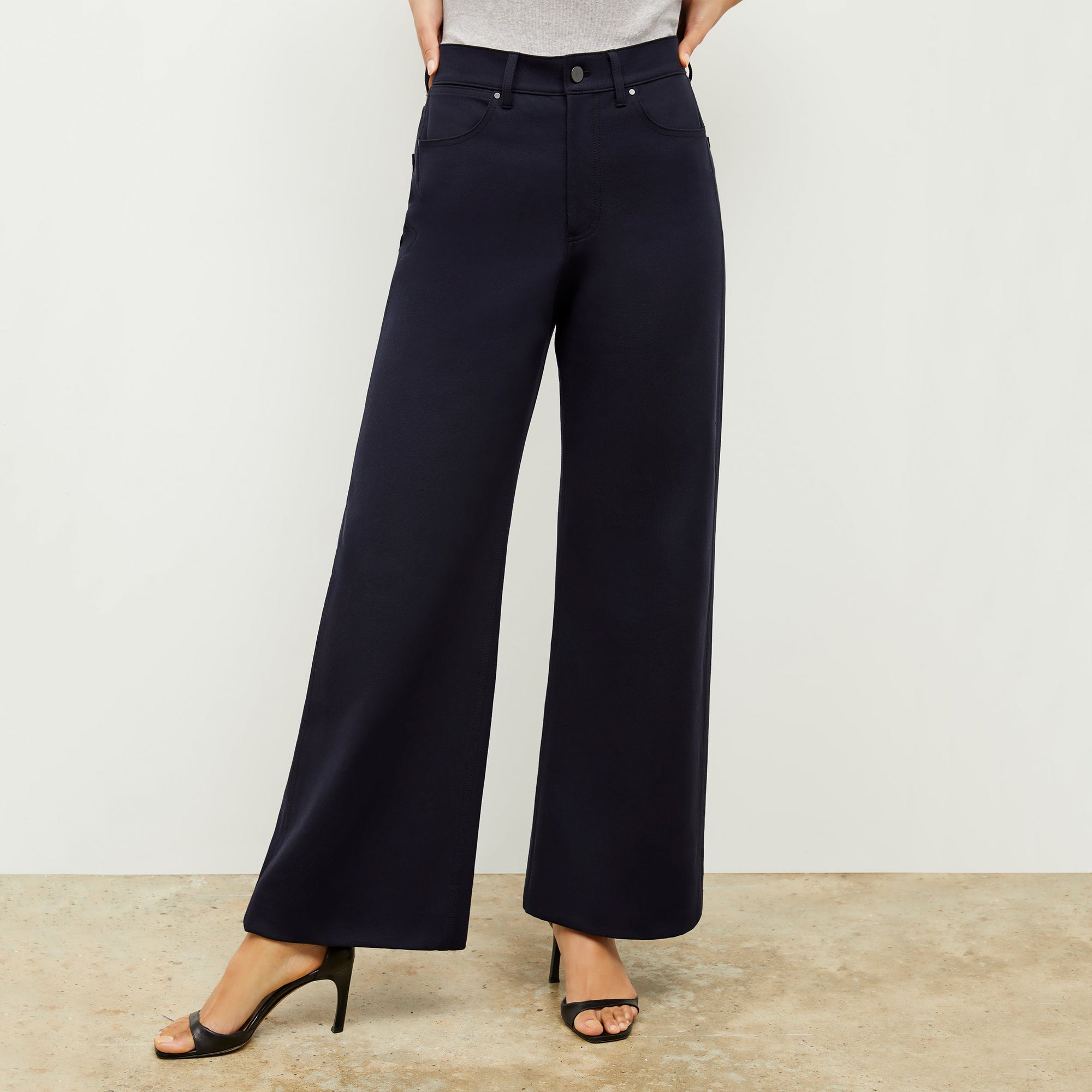 Front image of a woman standing wearing the Milo Jean in ink | Exclude