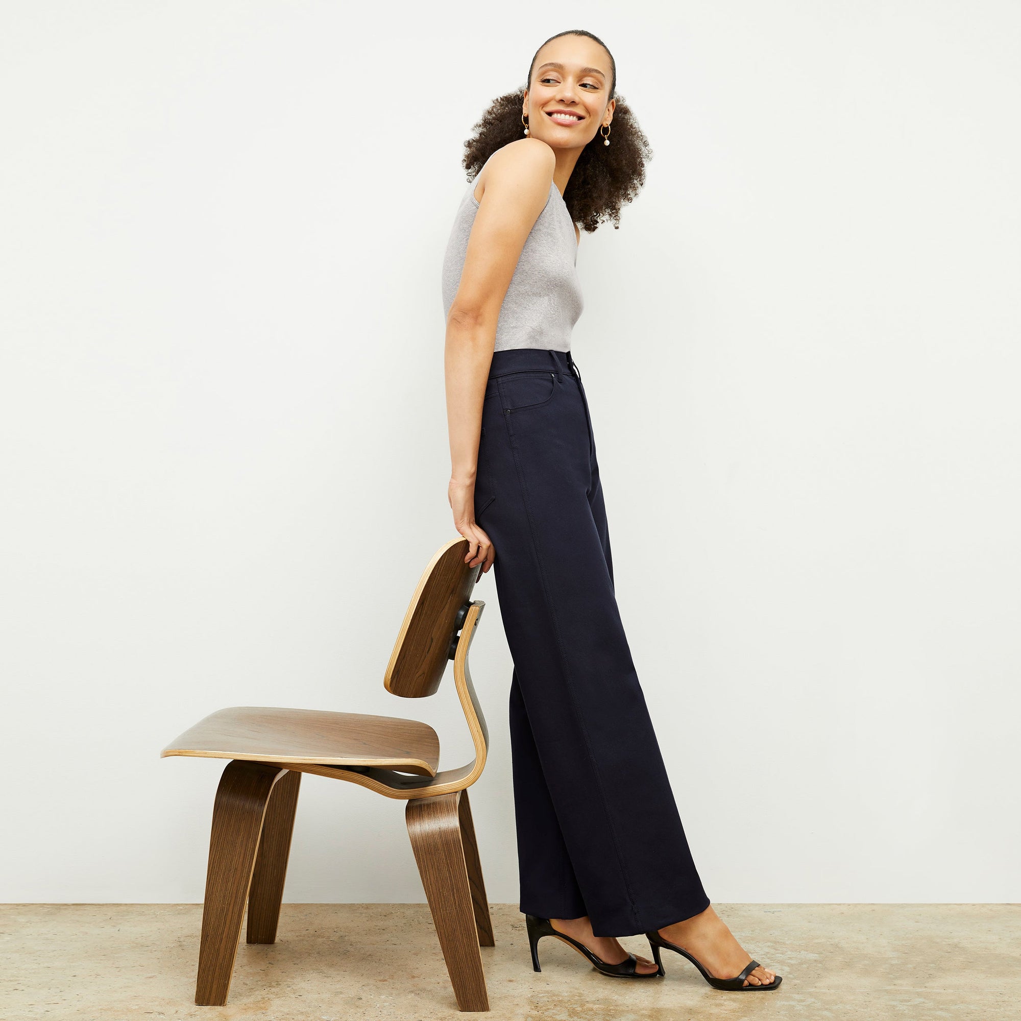 Front image of a woman standing wearing the Milo Jean in ink | Exclude