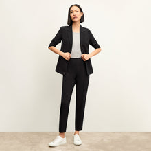 Front image of a woman standing wearing the Colby Jogger in Black | Lead