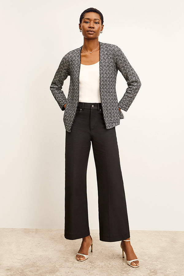 front image of a woman wearing the woolf jardigan in black/ivory | Exclude