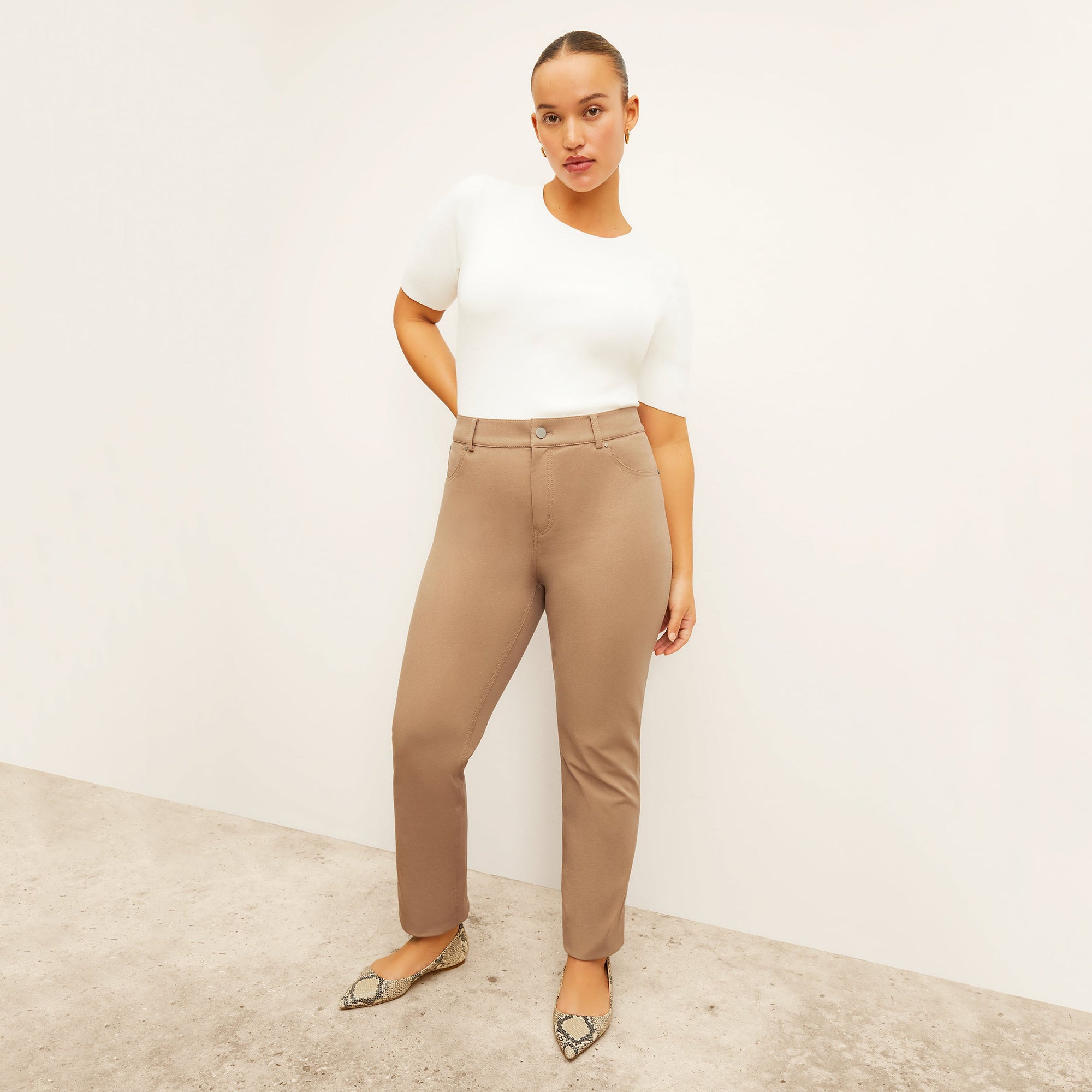 front image of a woman wearing the roma jean in saddle | Exclude