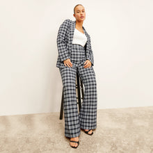 Front image of a woman wearing the O'Hara Blazer