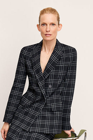 front image of a woman wearing the o'hara blazer in black/white | Exclude | Grid