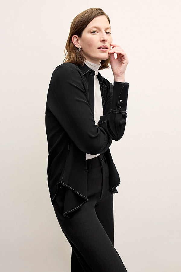 front image of a woman wearing the mira top in black | Exclude