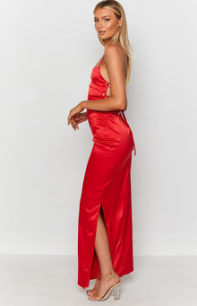 Cherry red satin slip dress with side lacing, gold eyelets, and a high leg slit formal