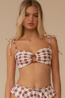 Maroon and cream plaid bandeau bikini top with tie shoulder straps and center cutout detail.