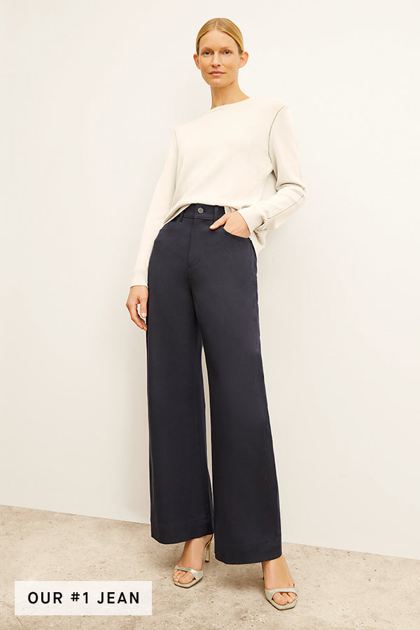 Front image of a woman standing wearing the Milo Jean in ink | Exclude