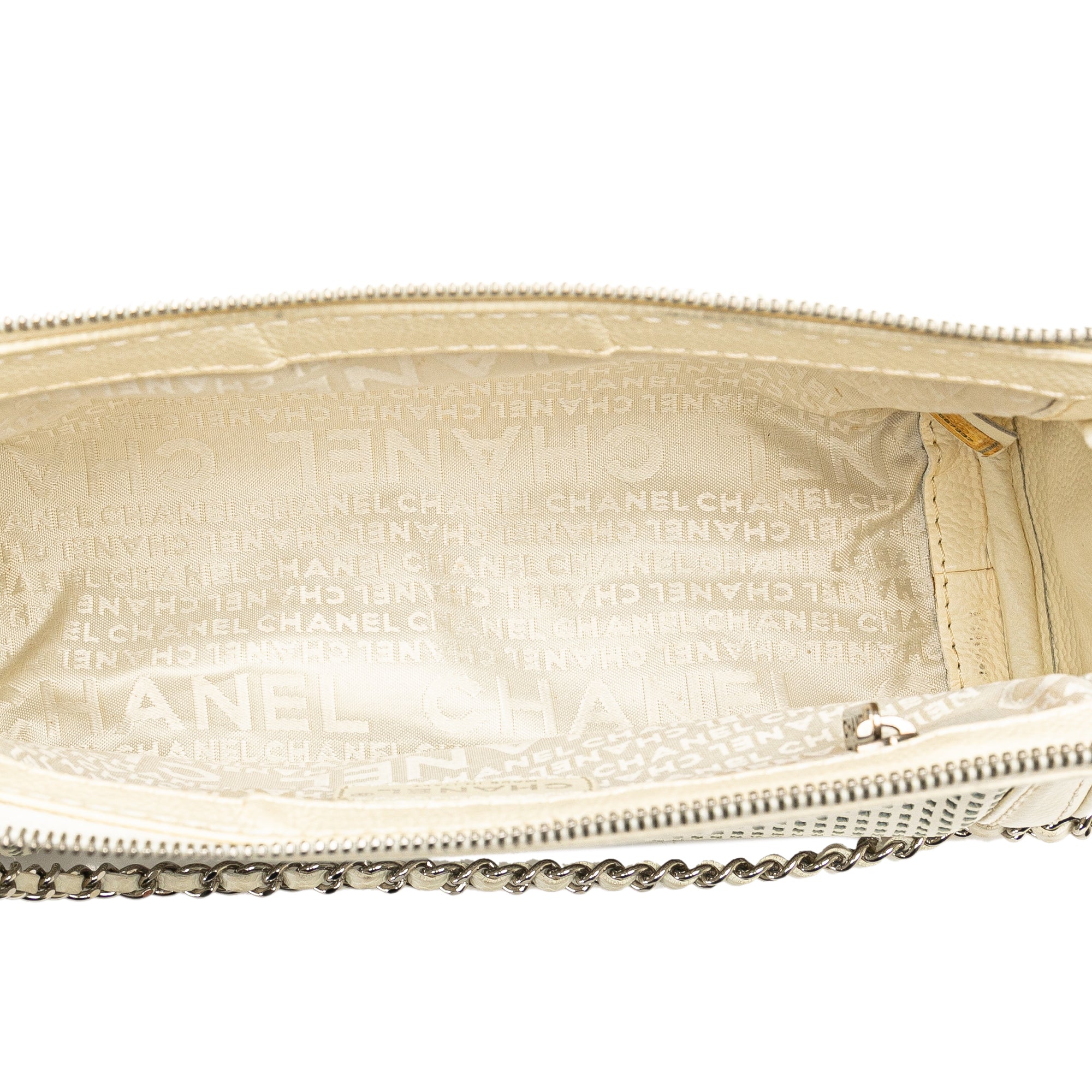 Chanel | Pre-Owned Caviar Perforated Pulley Shoulder Bag | White/Ivory