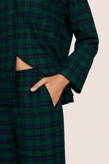 Model is wearing Flannel Long PJ Set  in Blk Watch Tartan Rainforest/Na