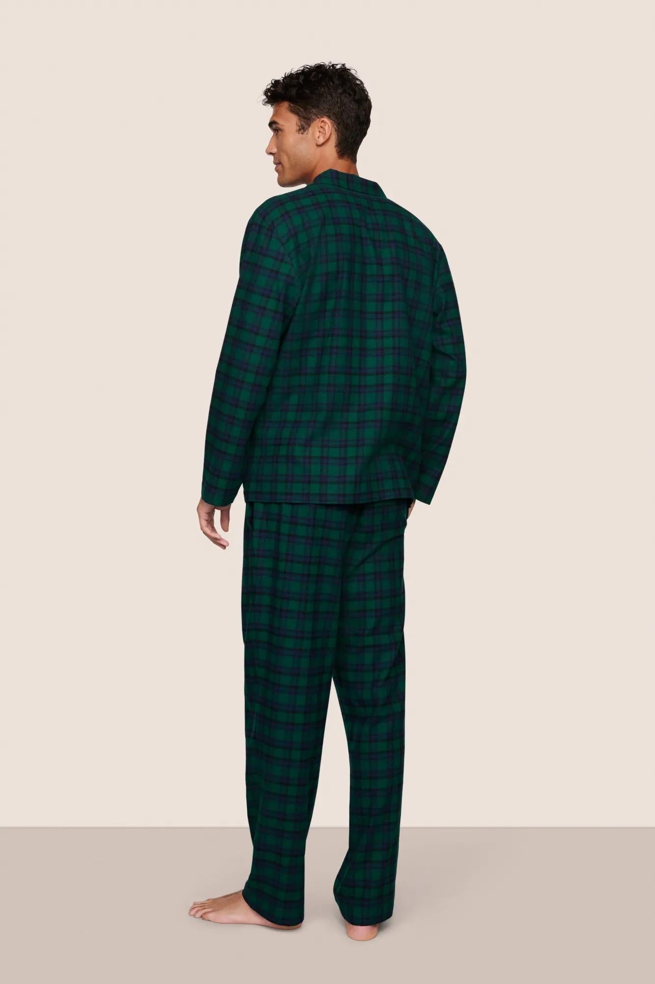 Model is wearing Men's Flannel Long PJ Set  in Blk Watch Tartan Rainforest/Na