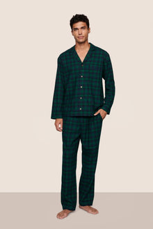 Model is wearing Men's Flannel Long PJ Set  in Blk Watch Tartan Rainforest/Na