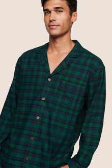Model is wearing Men's Flannel Long PJ Set  in Blk Watch Tartan Rainforest/Na