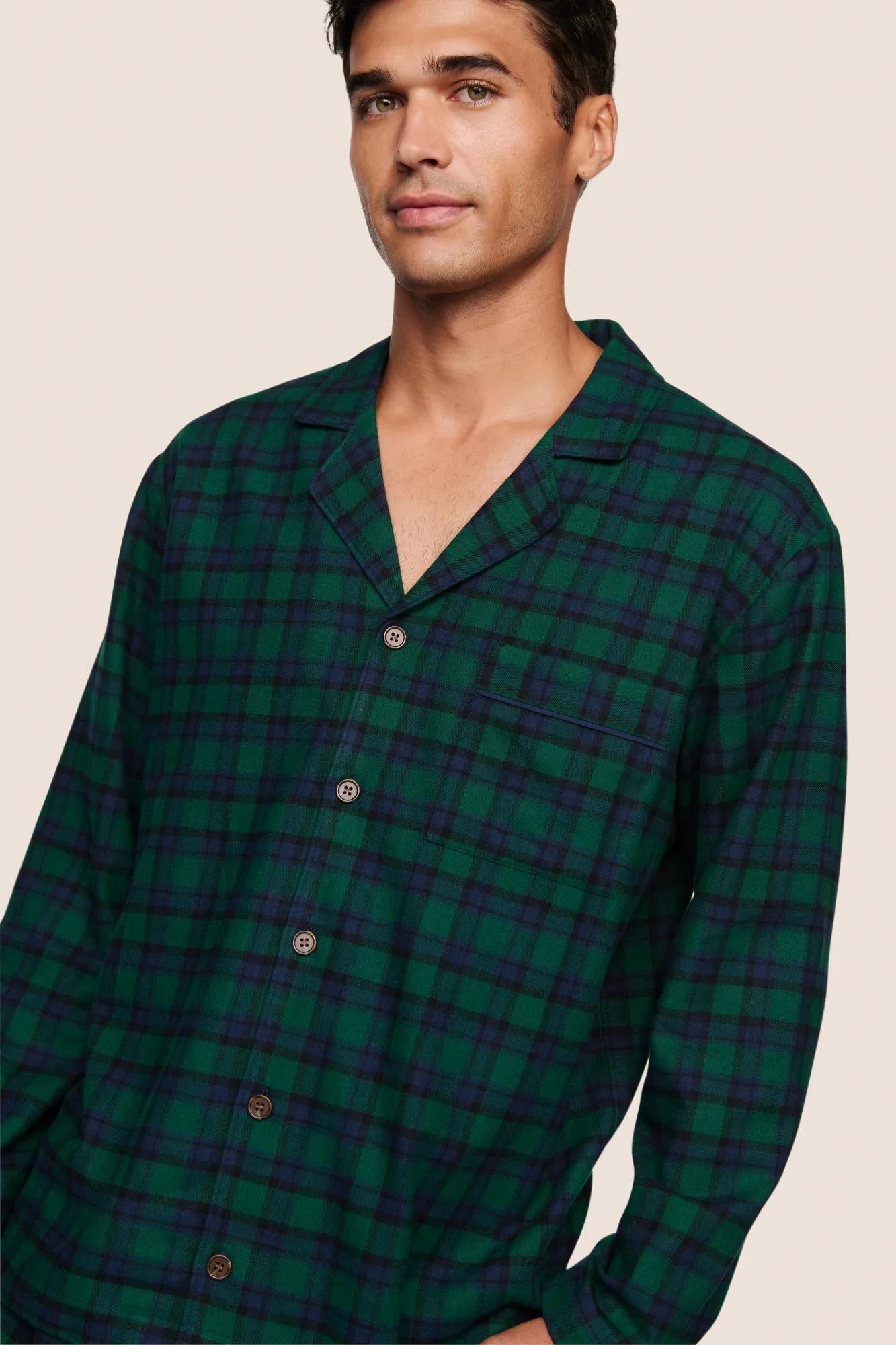 Model is wearing Men's Flannel Long PJ Set  in Blk Watch Tartan Rainforest/Na