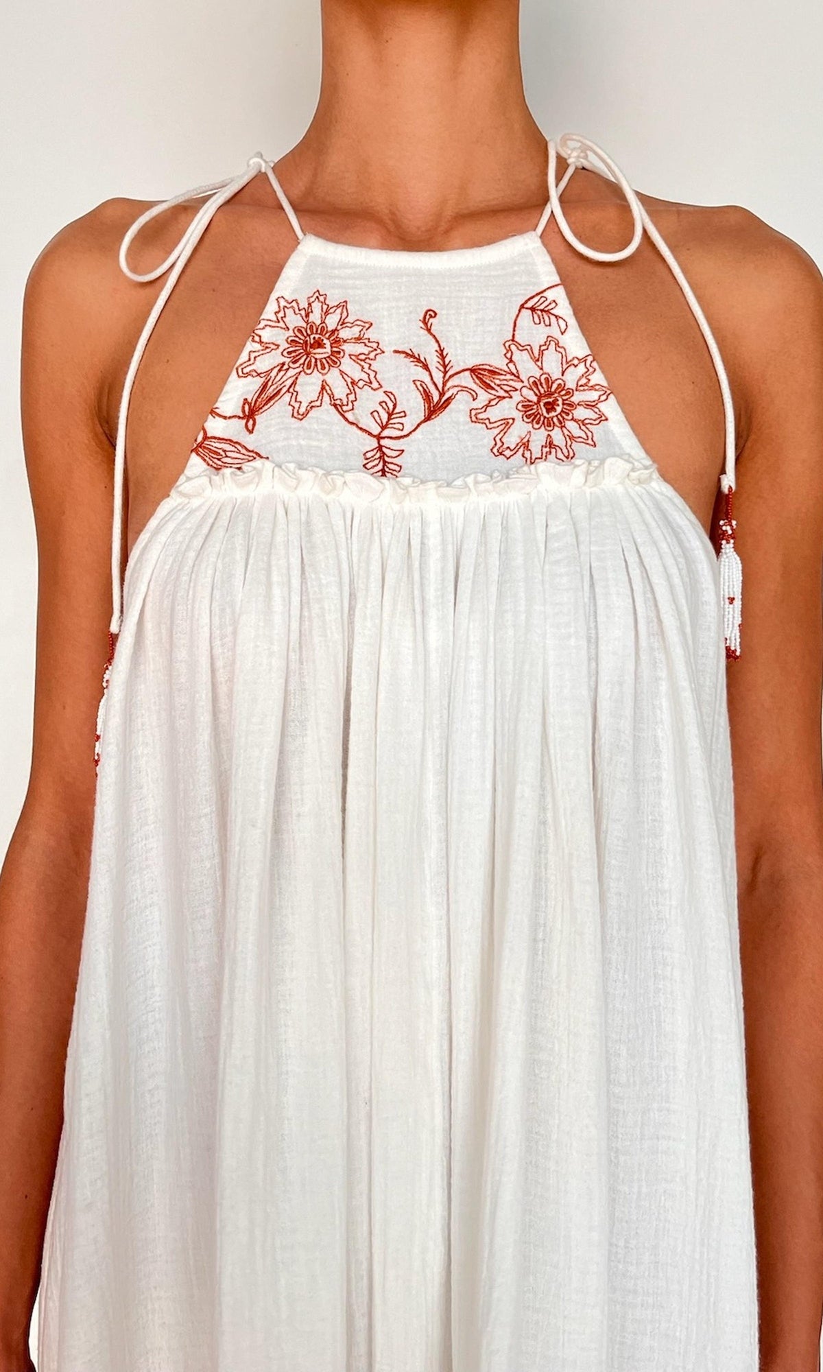 Rococo Sand | Myril Cotton Double Cloth Gauze Embroidered Tier Halterneck Maxi Dress | White Terracotta