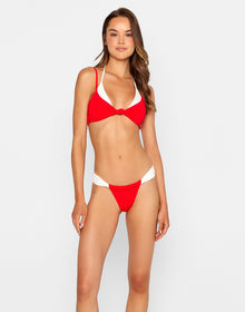 model is wearing the rumi bralette and rumi tango bottom in red and white
top is a triangle and bralette all in one
bottom has minimal coverage