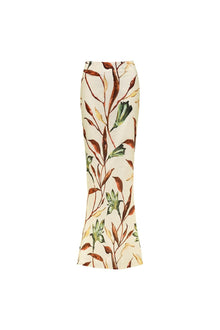 Cream maxi skirt with botanical print featuring rust and green branches and leaves throughout.