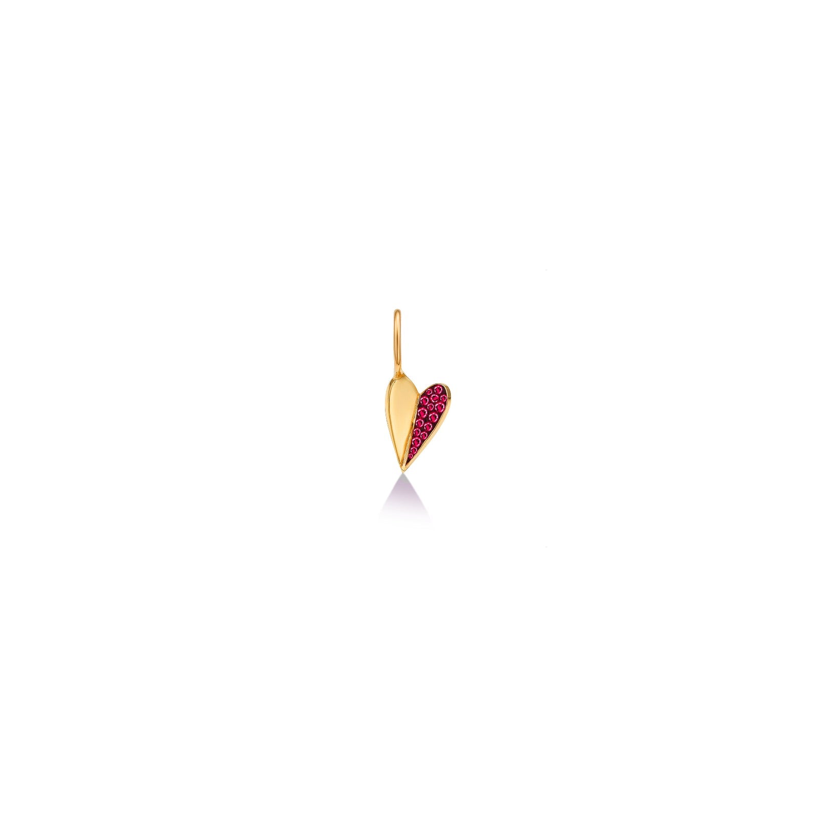 14k yellow gold small folded heart charm with pave red ruby stones on a blacked right side.