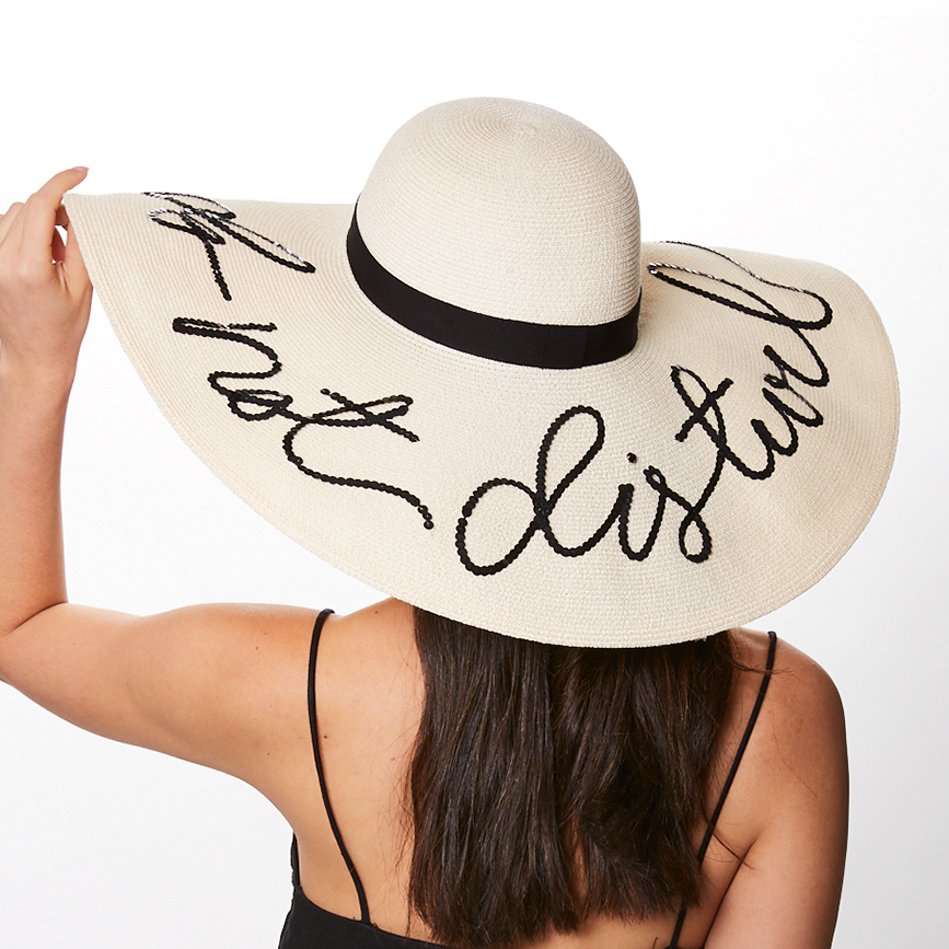 Eugenia Kim Sunny 'do not disturb' sunhat in ivory back view on model