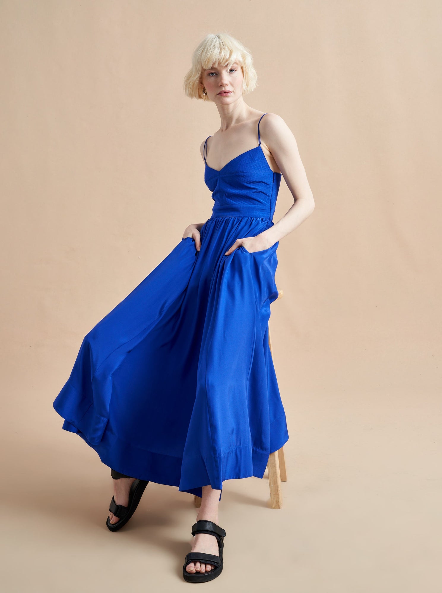 Named after La Bande member Tracy Dubb, this exquisitely detailed dress features a sweetheart neckline with double spaghetti straps, a trapunto stitched bodice with smocked back panel for ease of fit, and a sweeping skirt with side seam pockets. There is nothing not to love in this fabulously romantic dress.