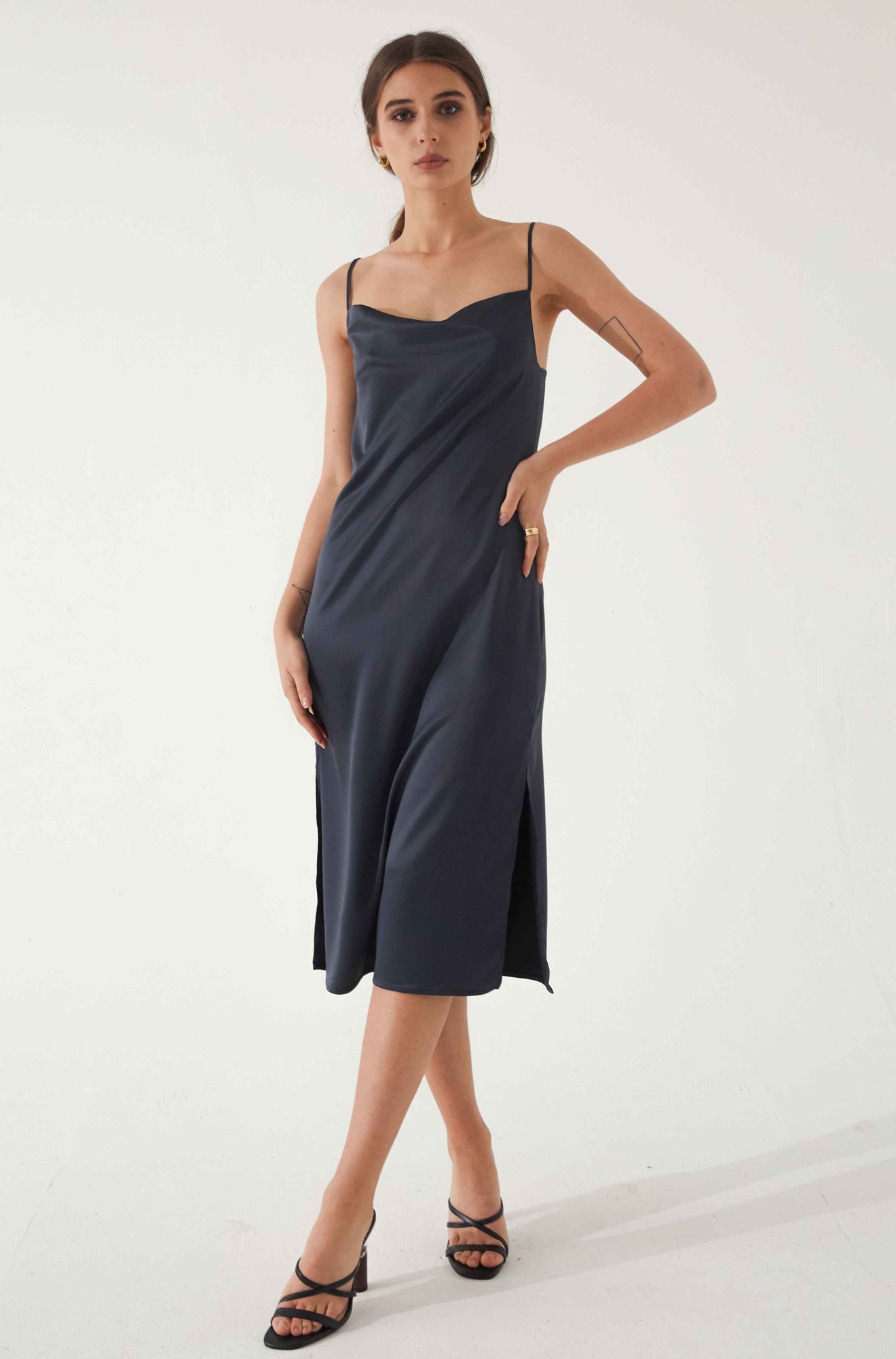 Woman wearing a blue silk dress