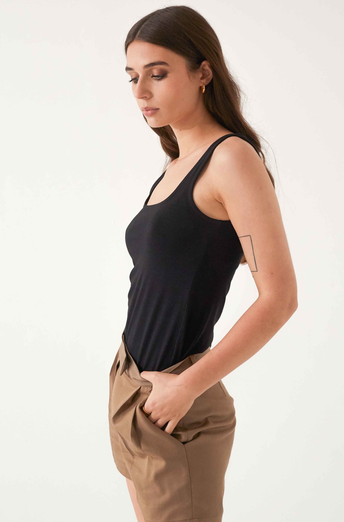 Woman wearing a black tank top