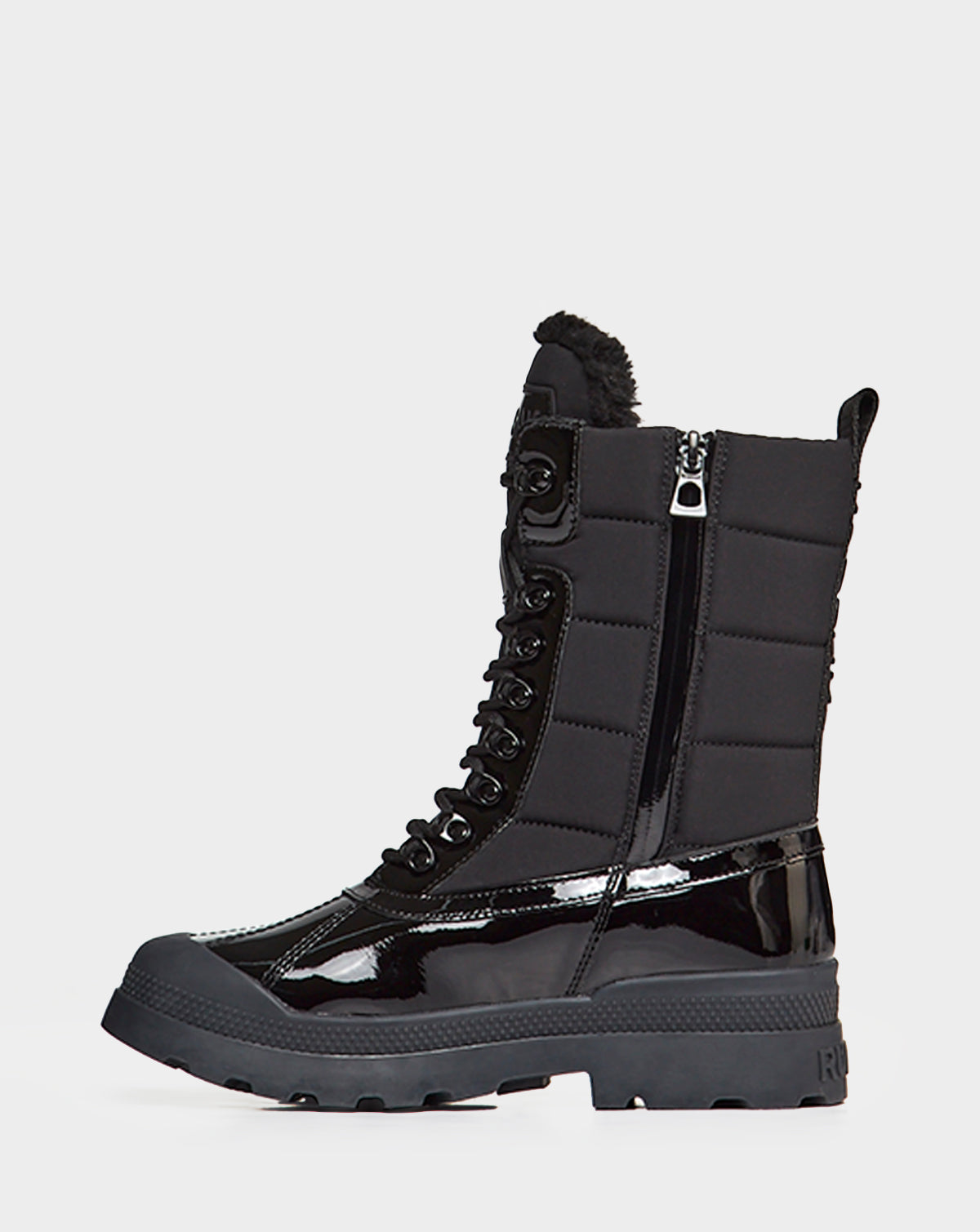 The Rudsak LEX - 8222501 BLACK women's winter boot has a chunky sole, lace-up front, side zipper, shiny patent lower, quilted upper, and fleece lining—offering stylish warmth and comfort all winter.